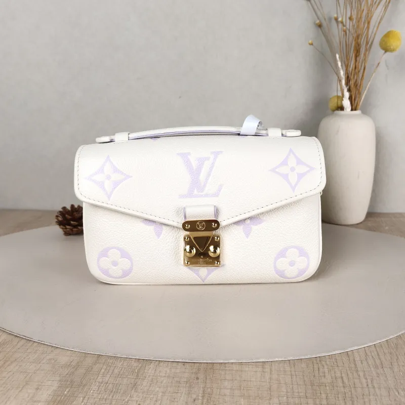 Louis Vuitton Crossbody Bag Pochette Métis East West White · Monogram Empreinte Embossed Calfskin Small 21.5 × 6 × 13.5 cm