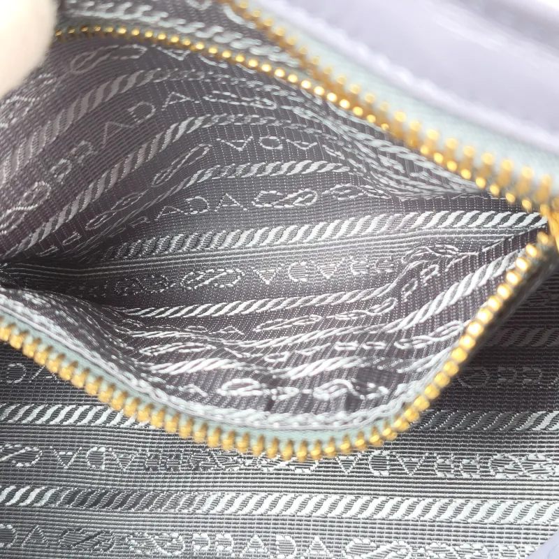 PRADA Top Handle Bag Bonnie Soft Lux Blue Waxed Leather Mini 23.5 × 9 × 12 cm — detail view 11 of 14