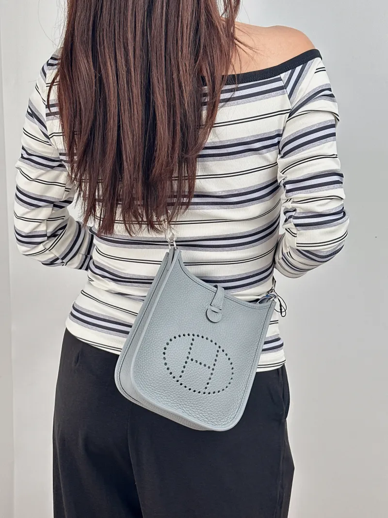 Hermès Crossbody Bag Evelyne Mini 16 Mini 16 TC Calfskin Mini 17 × 5.5 × 18 cm k — on-model view 1 of 2