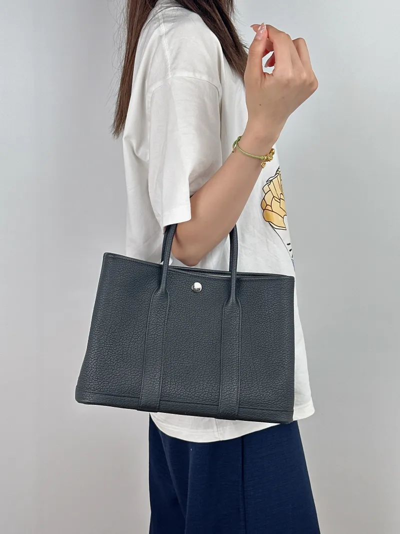 Hermès Top Handle Bag Garden Party 30 30Black Negonda Calfskin Medium30 × 13 × 21 cm — on-model view 2 of 2