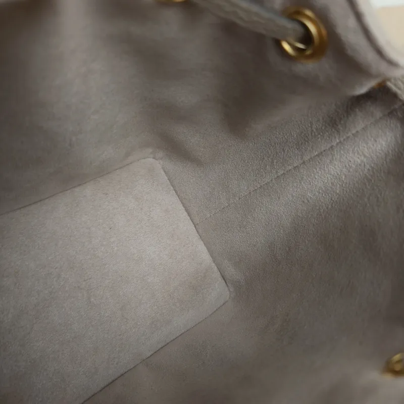 Louis Vuitton Crossbody Bag NANO NOÉ Bucket Bag Nano · White Empreinte Embossed Calfskin Monogramnano13 × 10 × 16 cm — detail view 9 of 11