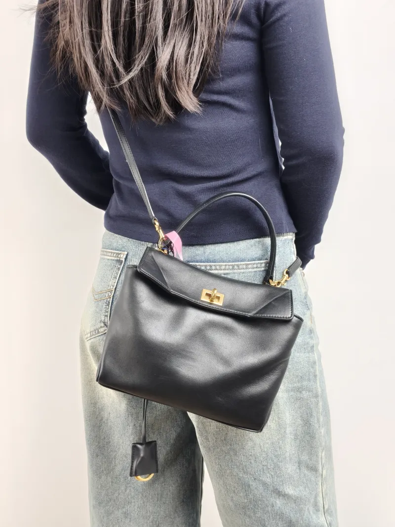 BALENCIAGA Crossbody Bag RODEO Black CC alfskin Mini 23 × 10 × 17 cm — on-model view 1 of 2