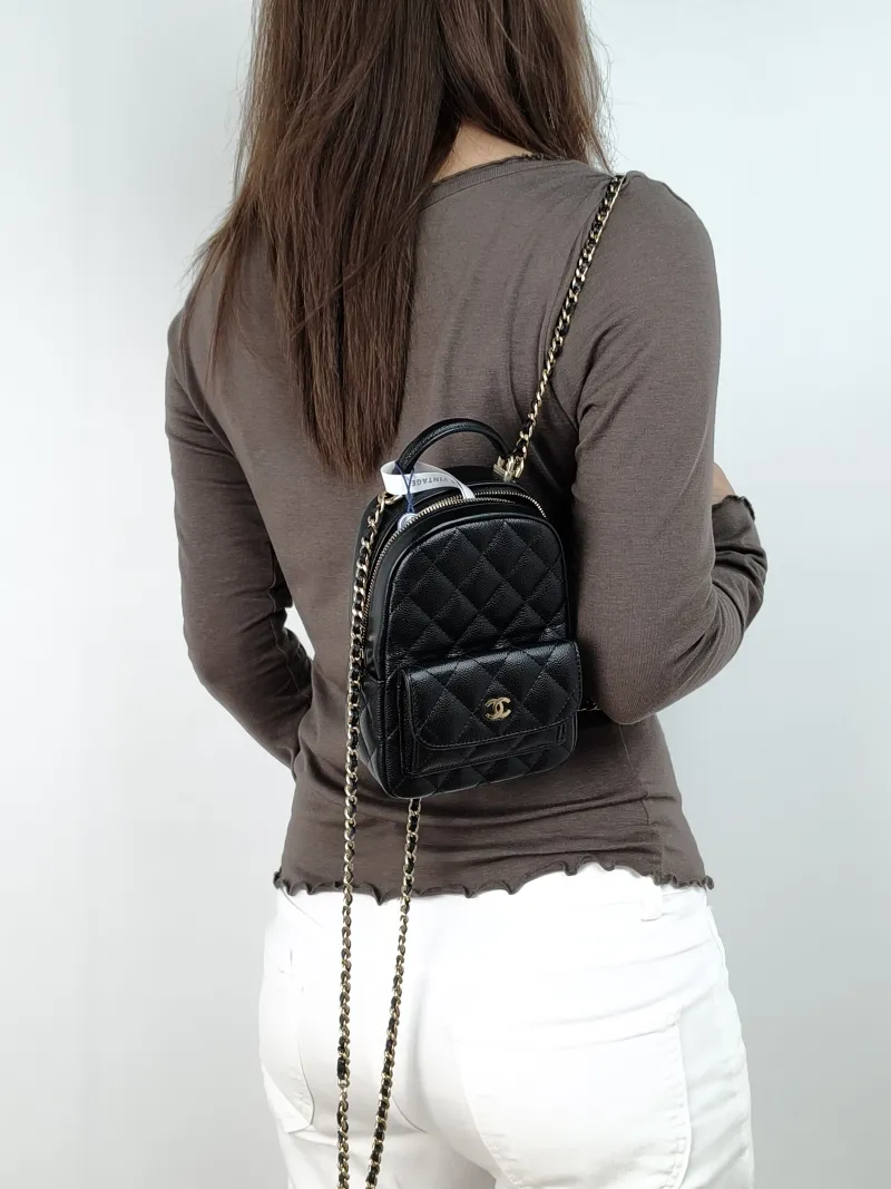Chanel Backpack mini Backpack Collection Black Grained Calfskin One Size13 × 9 × 18 cm — on-model view 1 of 3