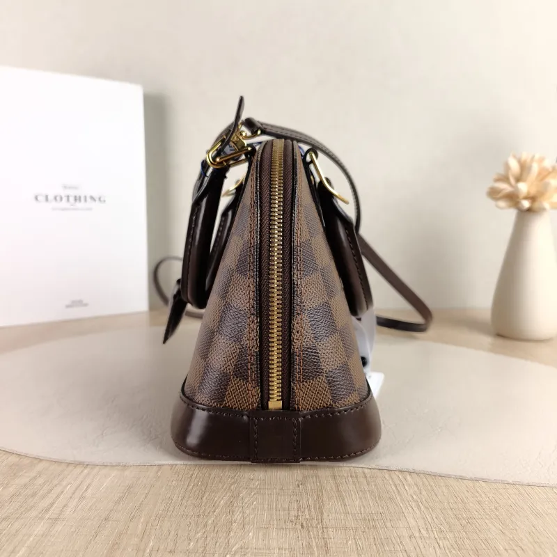 Louis Vuitton Crossbody Bag Alma BB Brown PVC BB 23.5 × 11.5 × 17.5 cm — detail view 1 of 10