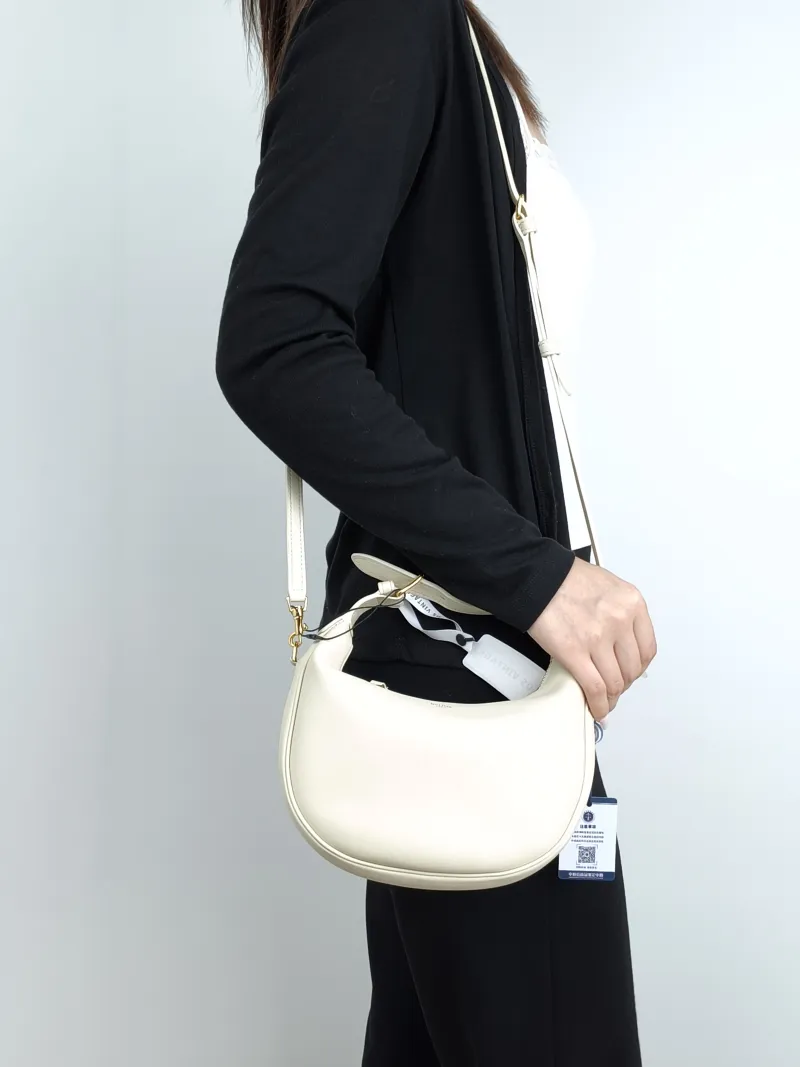 CELINE Crossbody Bag TEEN LULU hobo White Calfskin Small21 × 5 × 24 cm — on-model view 1 of 3