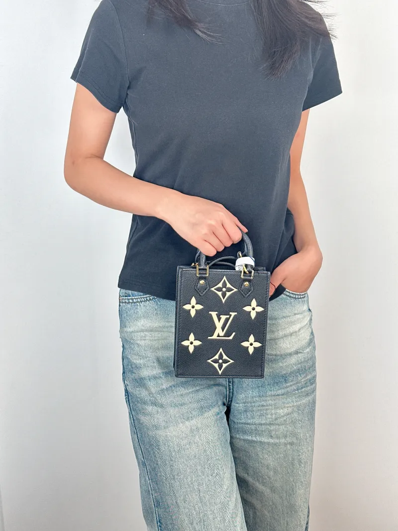 Louis Vuitton Crossbody Bag PETIT SAC PLAT Mini Calfskinmini14 × 5 × 17 cm — on-model view 1 of 3