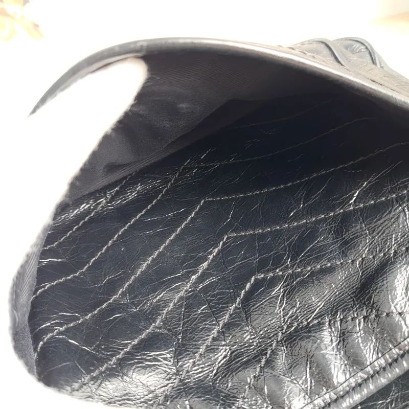 SAINT LAURENT Crossbody Bag Niki Black Waxed Leather Calfskin Medium 28 × 8.5 × 20 cm — detail view 2 of 13