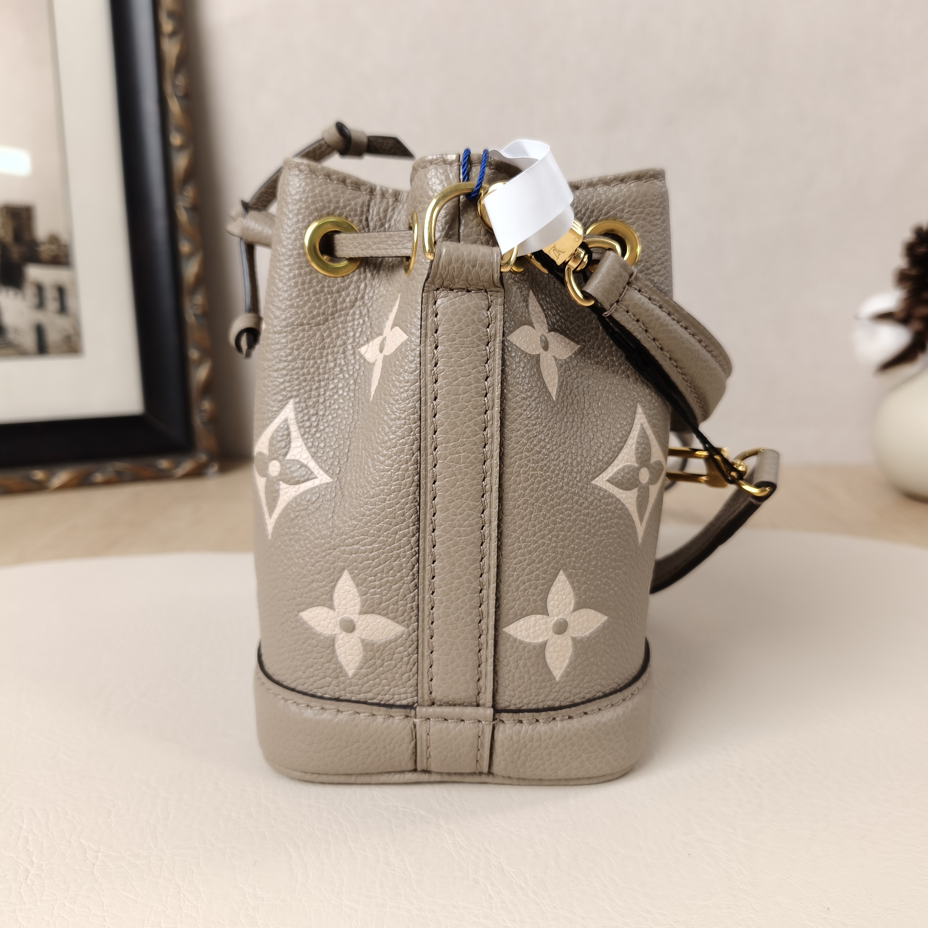 Louis Vuitton Crossbody Bag NANO NOÉ Bucket Bag Nano · White Monogram Empreinte Embossed Calfskinnano13 × 10 × 16 cm — cover view 9 of 10