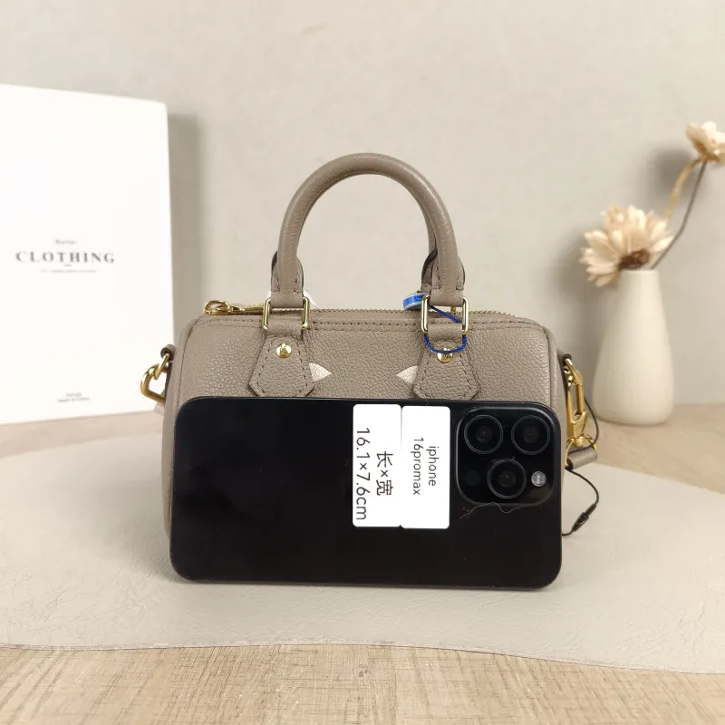 Louis Vuitton Crossbody Bag Speedy Nano · White Empreinte Embossed Calfskin Monogramnano16 × 7.5 × 10 cm — cover view 4 of 5