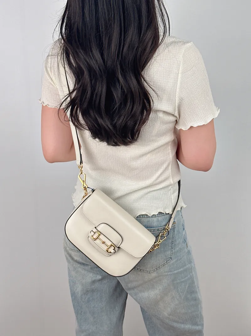 GUCCI Crossbody Bag Horsebit 1955 Horsebit Small White Calfskin Small 20.5 × 5 × 14.5 cm — on-model view 1 of 2