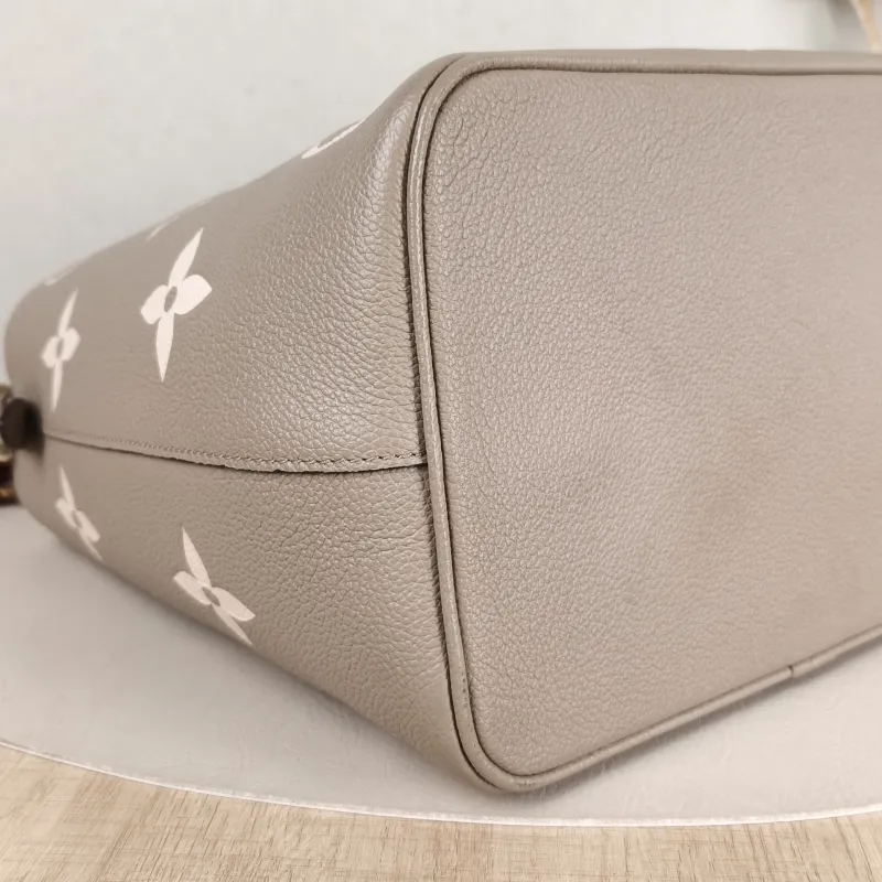 Louis Vuitton Shoulder Bag NÉONOÉ Bucket Bag · White Monogram Empreinte Embossed Calfskin Medium 26 × 17.5 × 26 cm — detail view 11 of 13