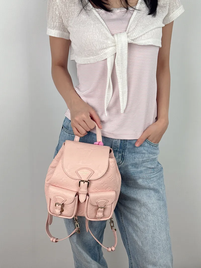 Louis Vuitton Backpack Backup Backpack Pink Calfskin One Size 20 × 14 × 22 cm — on-model view 2 of 3