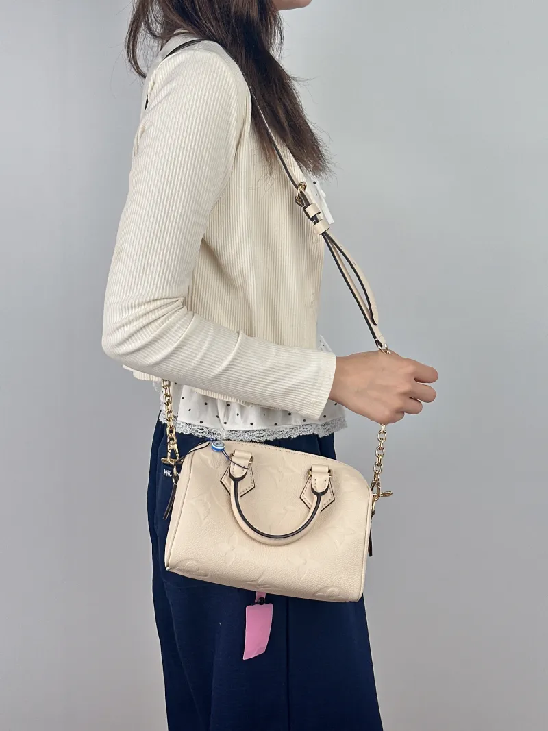 Louis Vuitton Crossbody Bag Speedy20 White Empreinte Embossed Calfskin Small 20.5 × 12 × 13.5 cm — on-model view 1 of 3