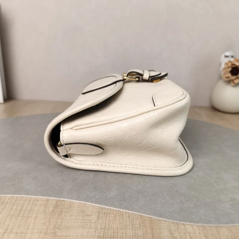 Louis Vuitton Crossbody Bag Diane Baguette Bag White Monogram Empreinte Embossed Calfskin Small 24 × 9 × 15 cm — detail view 6 of 11