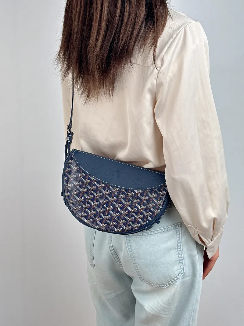 GOYARD Crossbody Bag Hirondelle Navy ine Canvas One Size 25 × 6 × 17 cm — on-model view 1 of 2