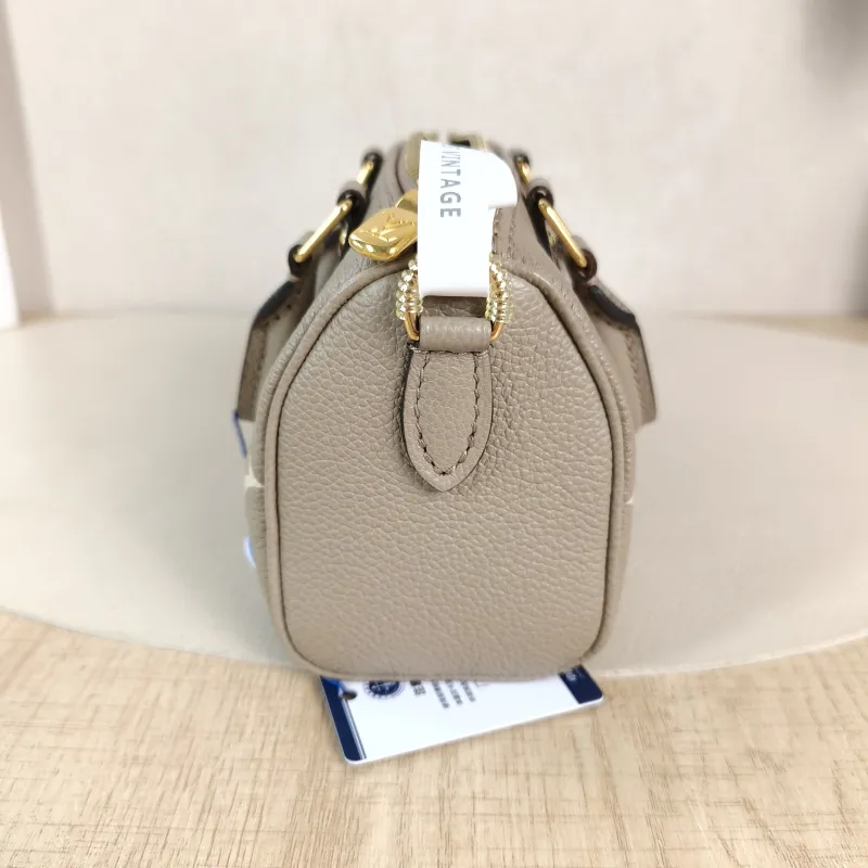 Louis Vuitton Crossbody Bag Speedy Nano · White Monogram Empreinte Embossed Calfskin nano 16 × 7.5 × 10 cm — detail view 5 of 11