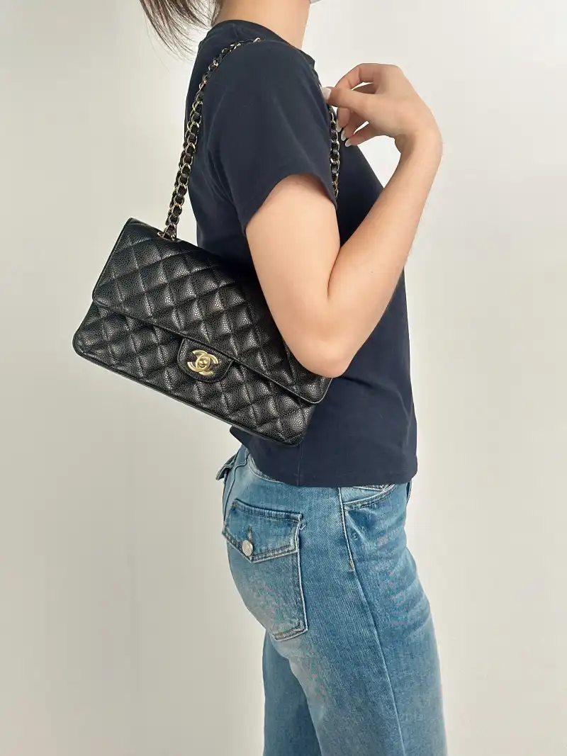 Chanel Crossbody Bag Classic Flap CF Black Grained Calfskin Medium 25.5 × 6.5 × 15.5 cm — on-model view 2 of 2