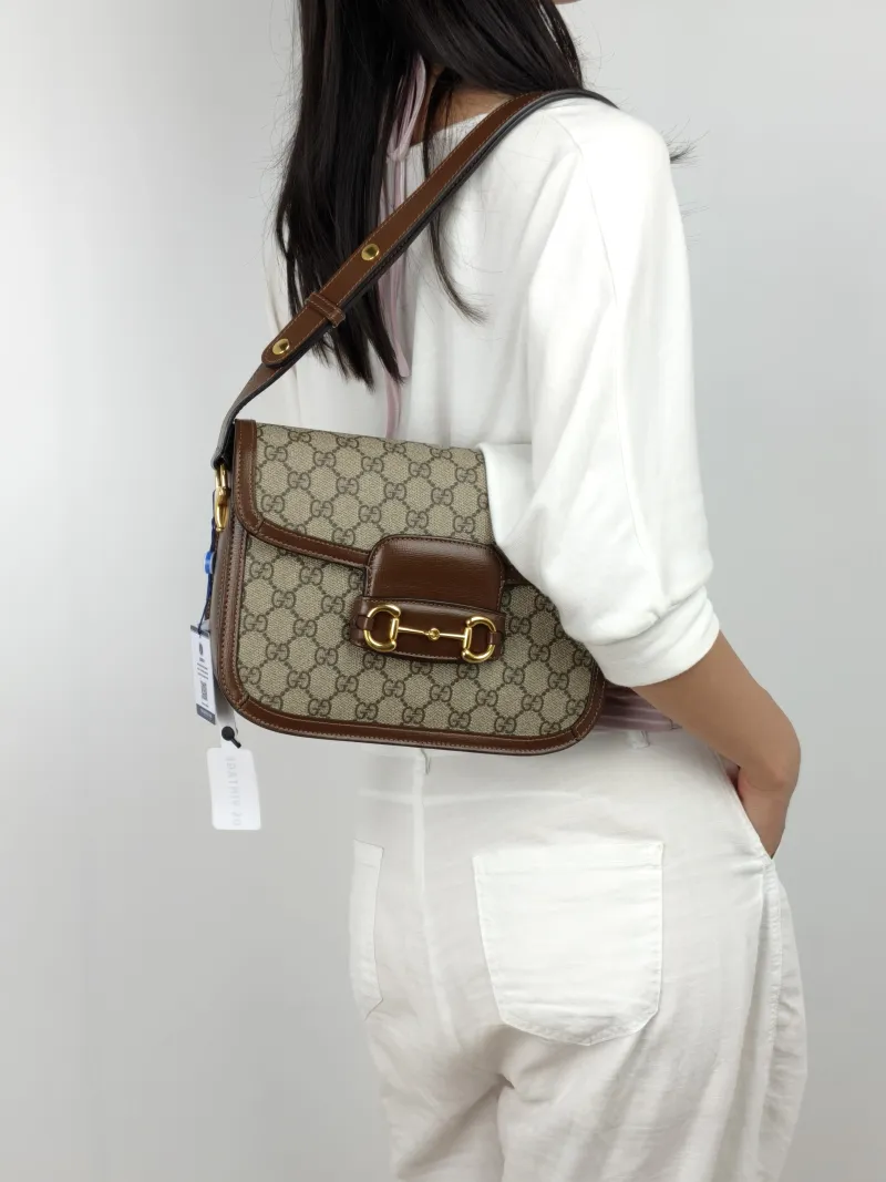 GUCCI Shoulder Bag Horsebit 1955 Horsebit Medium Monogram PVC Medium 25 × 8 × 18 cm — on-model view 1 of 3