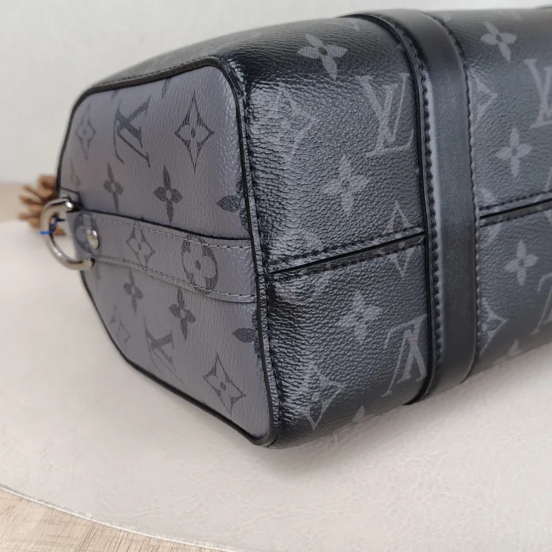 Louis Vuitton Crossbody Bag City Keepall Black PVC Medium 27 × 13 × 17 cm — detail view 10 of 12