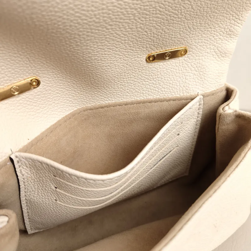 Louis Vuitton Crossbody Bag MADELEINE White Empreinte Embossed Calfskin nano 21 × 6 × 12.5 cm — detail view 6 of 11