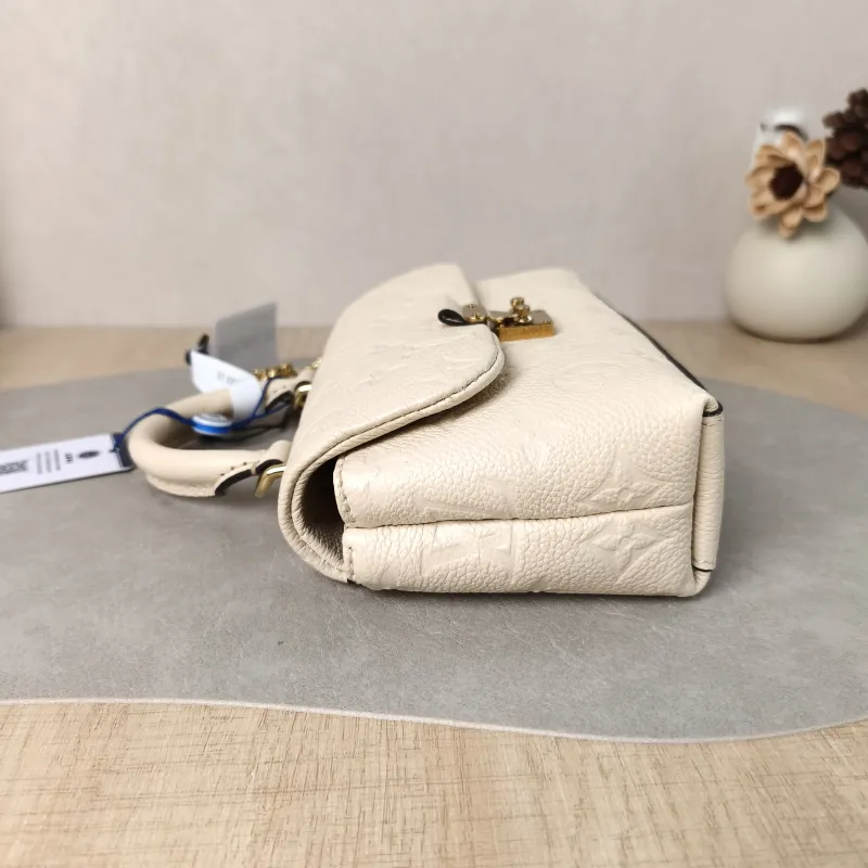 Louis Vuitton Crossbody Bag MADELEINE White Empreinte Embossed Calfskin nano 21 × 6 × 12.5 cm — detail view 6 of 11