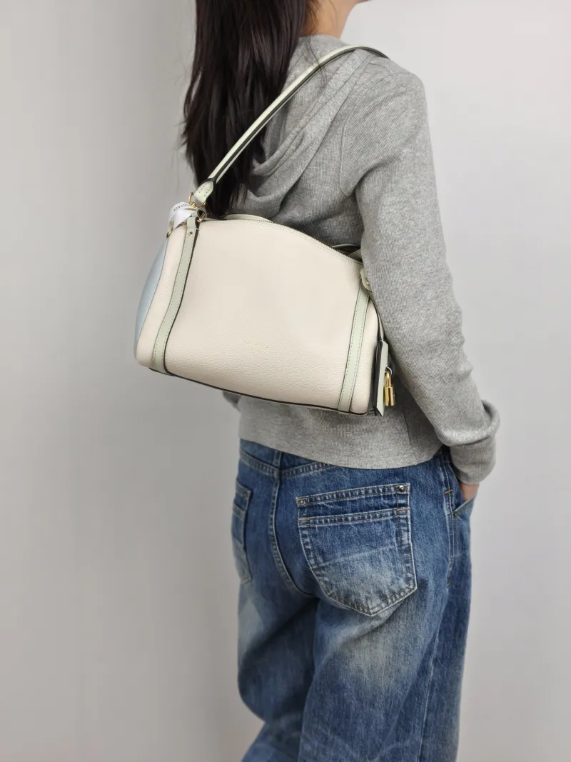Louis Vuitton Shoulder Bag EXPRESS Shoulder Bag White · Blue Green Calfskin Small 26 × 13.5 × 17 cm — on-model view 1 of 3