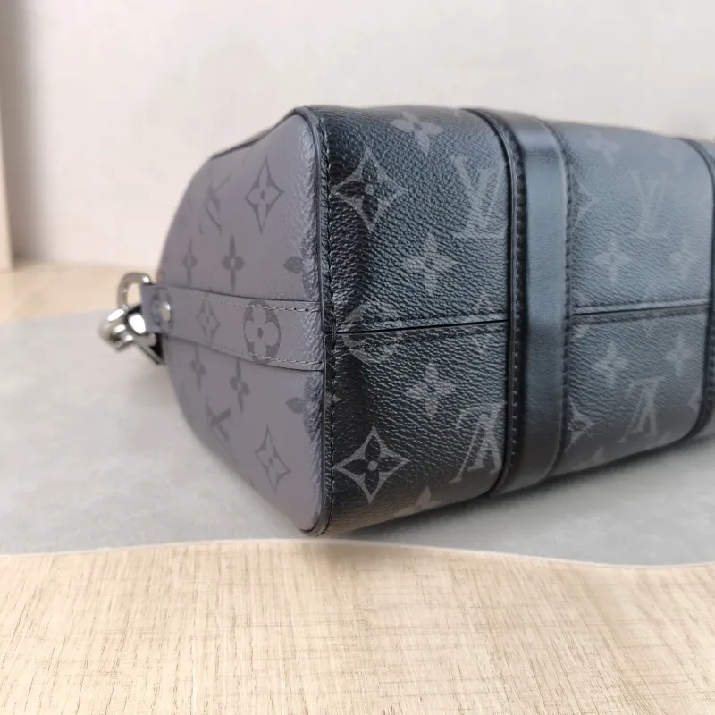 Louis Vuitton Crossbody Bag City Keepall Black PVC Medium 27 × 13 × 17 cm — detail view 11 of 12