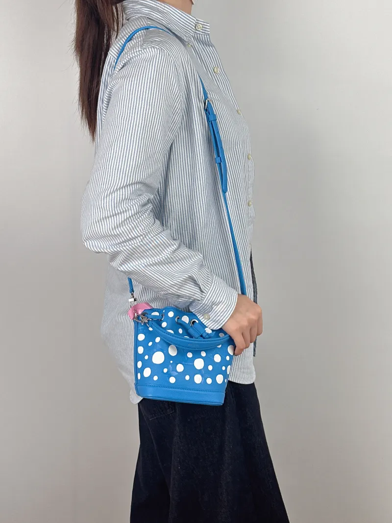 Louis Vuitton Shoulder Bag NANO NOÉ Bucket Bag Nano - Calfskin nano 13 × 10 × 16 cm — on-model view 2 of 3