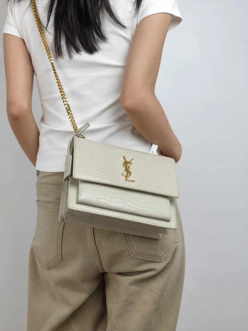 SAINT LAURENT Crossbody Bag SUNSET White Calfskin Medium 22 × 6.5 × 16 cm — on-model view 2 of 2