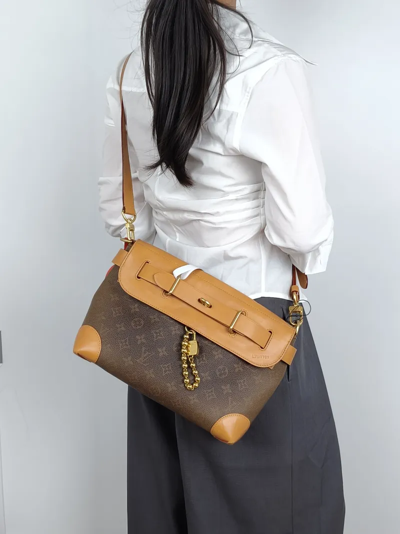 Louis Vuitton Crossbody Bag Steamer Messenger Bag Brown PVC One Size30 × 10 × 20 cm — on-model view 1 of 2