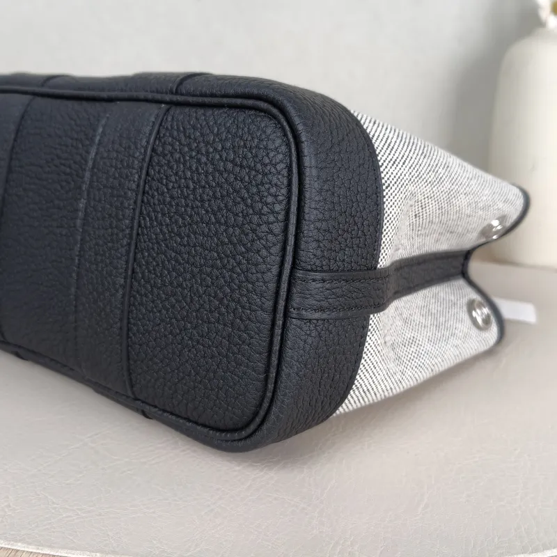 Hermès Top Handle Bag Neo Garden 23 Mini Black · Beige Canvas · Negonda Calfskinmini23 × 10 × 16 cm — detail view 1 of 9