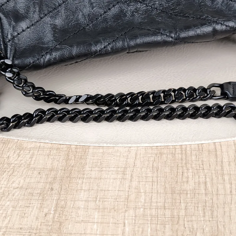 SAINT LAURENT Crossbody Bag Niki Black Waxed Leather Calfskin Medium 28 × 8.5 × 20 cm — detail view 4 of 14