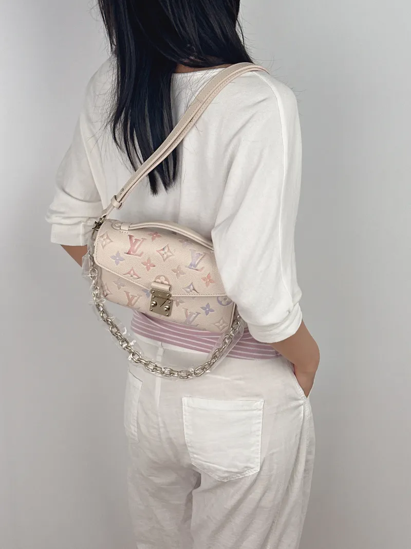 Louis Vuitton Crossbody Bag Pochette Métis East West Empreinte Embossed Calfskin Small 21.5 × 6 × 13.5 cm — on-model view 3 of 4