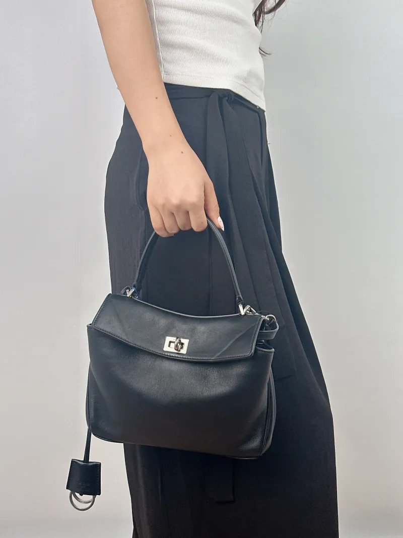 BALENCIAGA Crossbody Bag RODEO Black Calfskin Mini 23 × 10 × 17 cm — on-model view 2 of 2