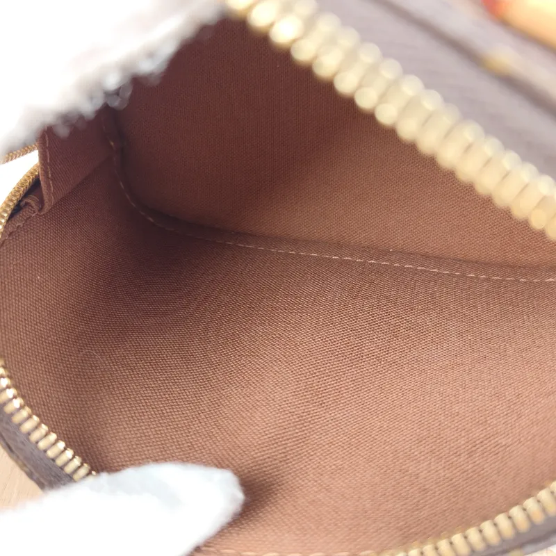 Louis Vuitton Crossbody Bag Alma Nano Monogram PVC nano 18 × 8 × 12 cm — detail view 3 of 10
