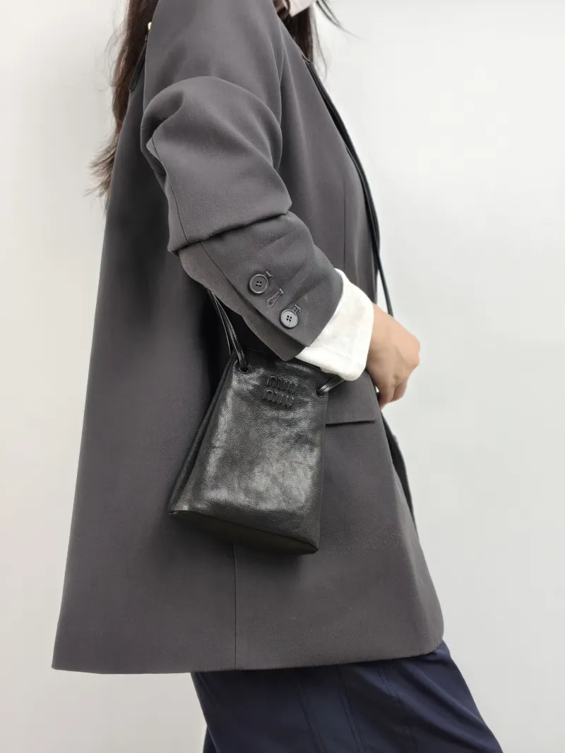 Miumiu Crossbody Bag logo Black Lambskin One Size 14 × 6 × 17 cm — on-model view 1 of 2