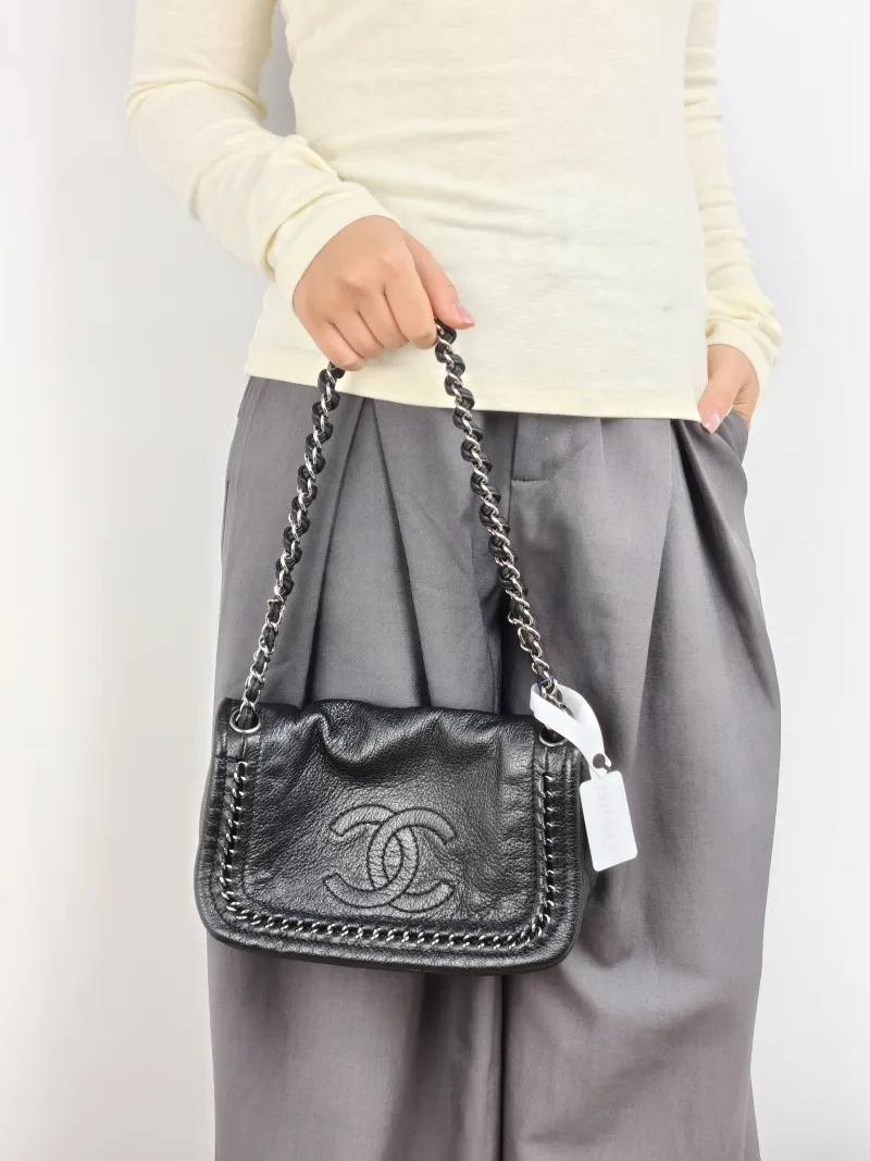 Chanel Shoulder Bag Black Calfskin 24 × 6 × 14 cm 10 Conditioned — on-model view 2 of 2