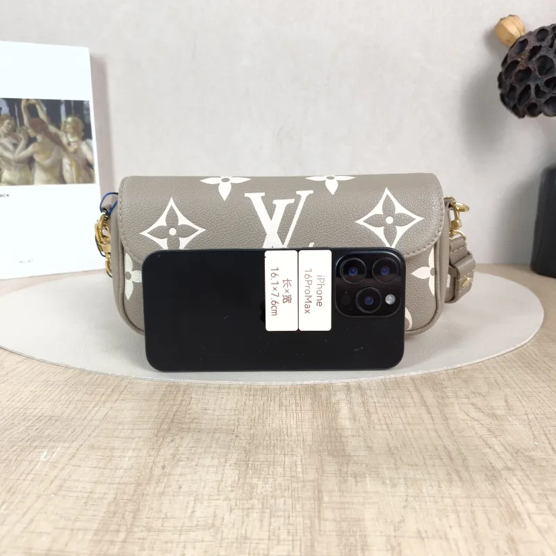 Louis Vuitton Crossbody Bag IVY Monogram Empreinte Embossed Calfskin Small 23.5 × 4.3 × 12 cm — cover view 6 of 6