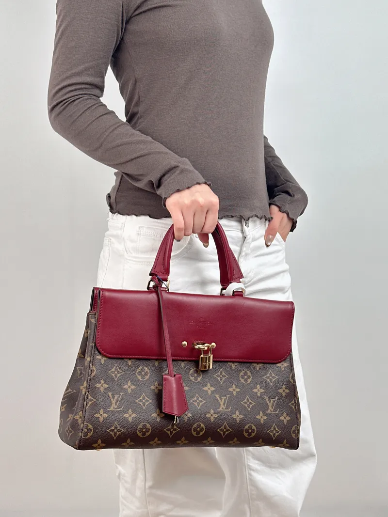 Louis Vuitton Shoulder Bag Venus Red PVC · Calfskin 34 × 12 × 22 cm — on-model view 2 of 2