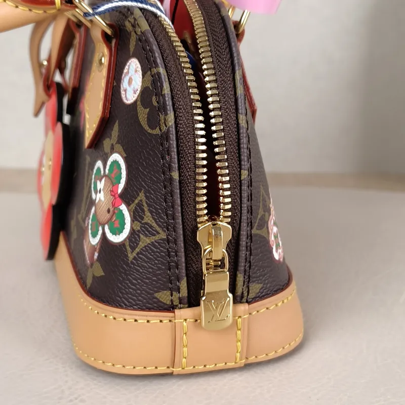 Louis Vuitton Crossbody Bag Alma Nano vivenne Monogram PVC nano 18 × 8 × 12 cm — detail view 11 of 11