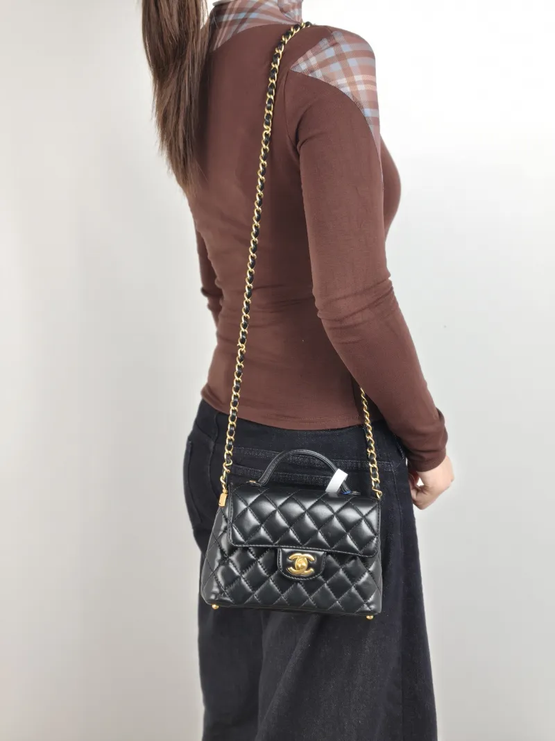 Chanel Crossbody Bag 25p Top Handle Crossbody Bag Black Lambskin Small 22 × 6 × 11.5 cm — on-model view 3 of 3