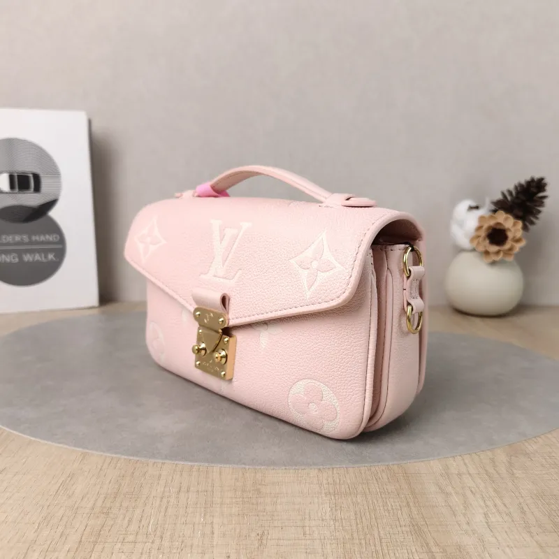 Louis Vuitton Crossbody Bag Pochette Métis East West Monogram Empreinte Embossed Calfskin Small 21.5 × 6 × 13.5 cm — cover view 5 of 5