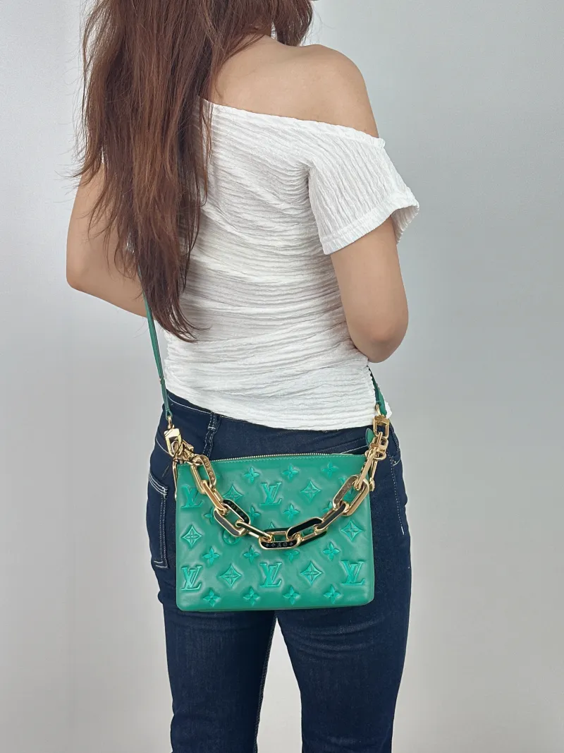Louis Vuitton Crossbody Bag Coussin BB Green Lambskin BB21 × 7 × 16 cm — on-model view 1 of 3