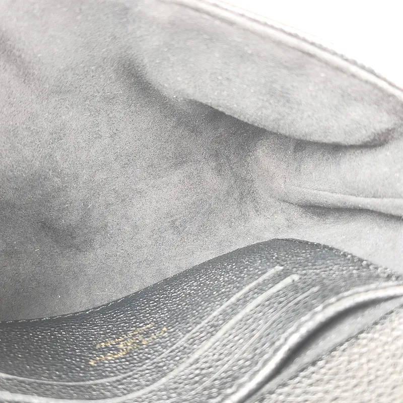 Louis Vuitton Crossbody Bag MADELEINE Black Monogram Empreinte Embossed Calfskin nano 21 × 6 × 12.5 cm — detail view 6 of 11