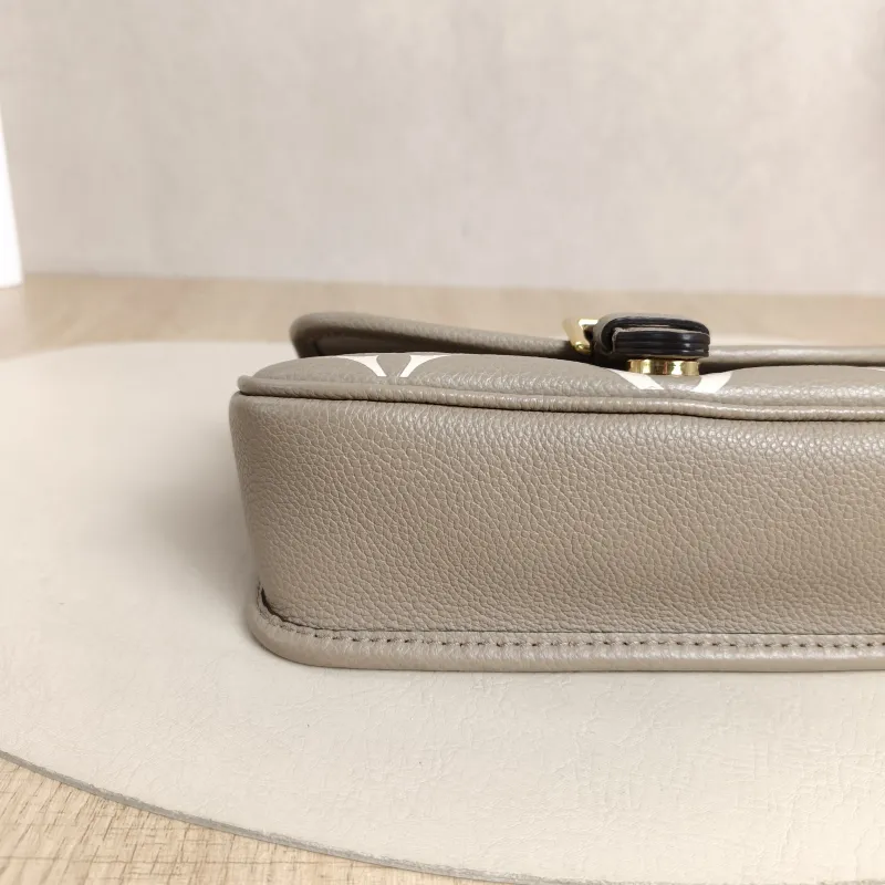 Louis Vuitton Crossbody Bag Diane Baguette Bag Empreinte Embossed Calfskin Monogramnano19 × 6 × 10.5 cm — detail view 2 of 13