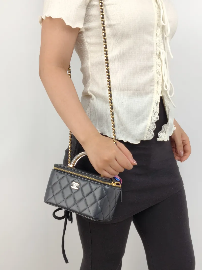 Chanel Crossbody Bag Edition Black Lambskin Mini 16 × 8 × 9.5 cm — on-model view 1 of 3