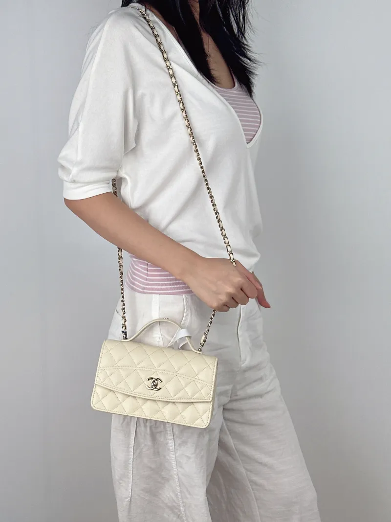 Chanel Crossbody Bag Yellow Calfskin One Size19 × 7 × 11.5 cm — on-model view 2 of 3