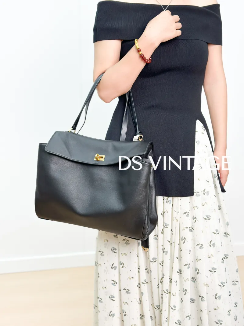 BALENCIAGA Crossbody Bag RODEO Black CC alfskin Medium35 × 11 × 23.5 cm — on-model view 2 of 3