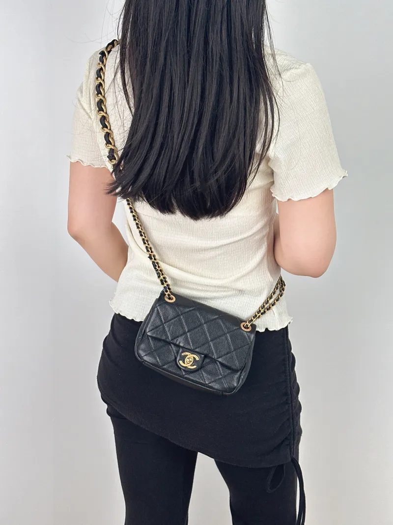 Chanel Crossbody Bag Black Calfskinmini17 × 4 × 12 cm — on-model view 2 of 2