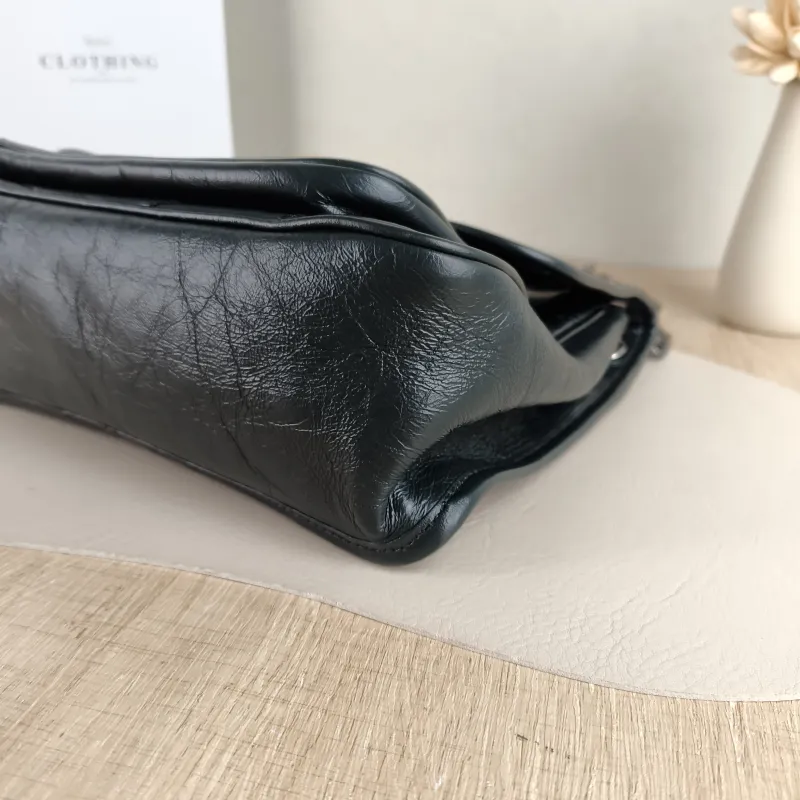 SAINT LAURENT Crossbody Bag Niki D Green Waxed Leather Medium 28 × 8.5 × 20 cm — detail view 1 of 13